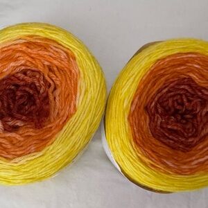 Yarn lot Knit Picks Stroll Gradient Yellow Orange and Red Yarn two cakes